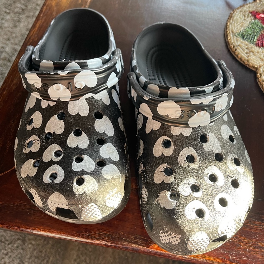 Crocs size 6 black and white with hearts